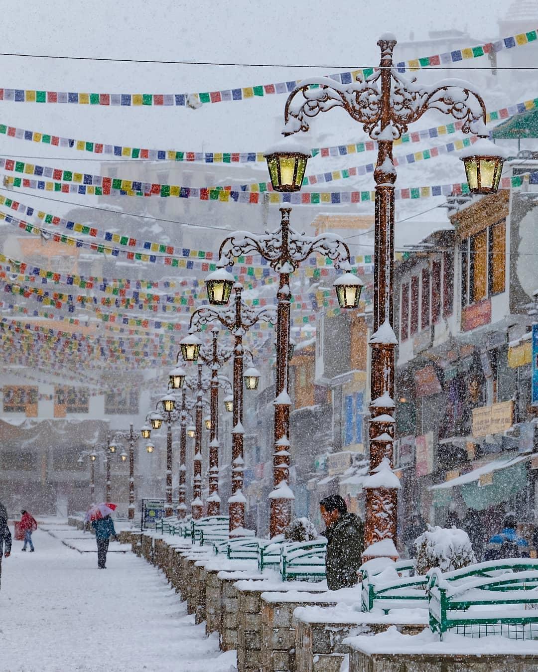 Snow covered Leh town and Himalayan mountains in winter January