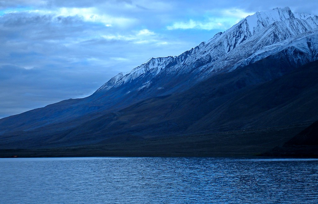 High mountain pass in Ladakh in November with crisp winter light and snow patches